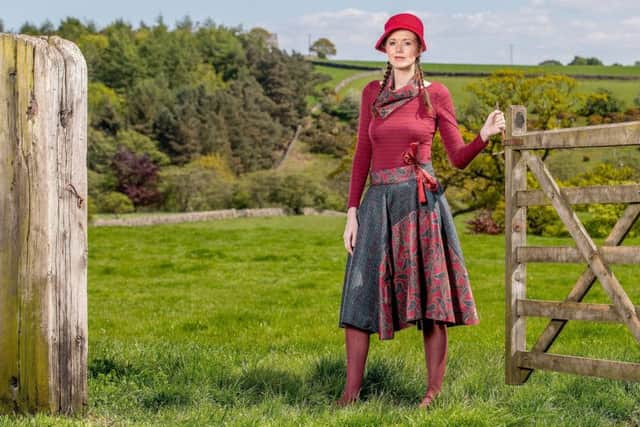 Bue/wine fine tweed full swing skirt, with panel insert in matching paisley print lined in taffeta with large side tie bow and matching tweed neck warmer, £89.
 Clothes by Galijah. Charlotte Graham

Pictures.