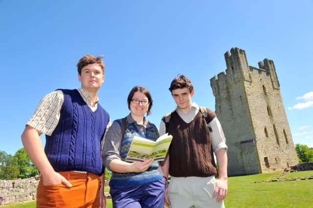 Three apprentices from the  North York Moors National Park preparing to leave Helmsley Castle to wal to Rievaulx  on the Cleveland Way  for the 5oth anniversary event. From left: Archie Lam, April Wimmer and Mathew Craggs.