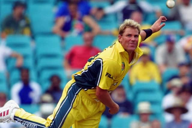 YOU'RE IN: Shane Warne in action at the SCG in 2003. Picture: AP/Dan Peled