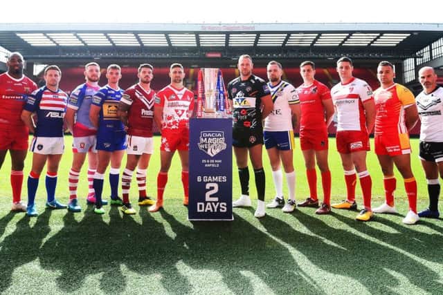 Players from each team on the Anfield pitch ahead of Magic Weekend.