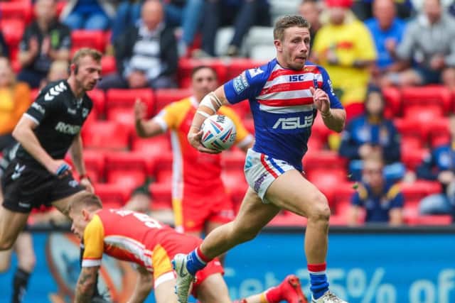 Wakefield Trinity's Kyle Wood races in for a try at Anfield (SWPix)