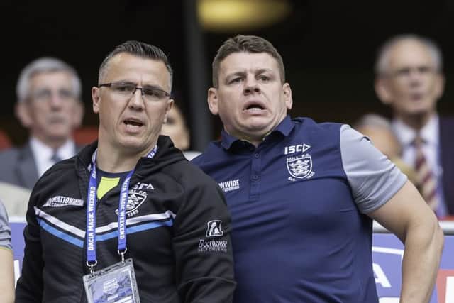 What's gone wrong?: Hull FC coach Lee Radford, right, is dejected after his side's 55-2 defeat to Huddersfield. Picture: Allan McKenzie/SWpix