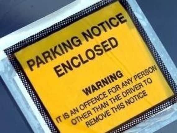 What should be done about motorists who flout parking laws?