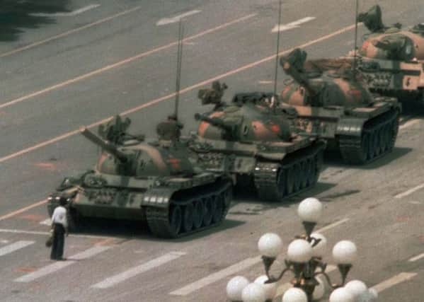 The famous image of a lone protester in Tiananmen Square on June 5, 1989. (AP Photo/Jeff Widener).
