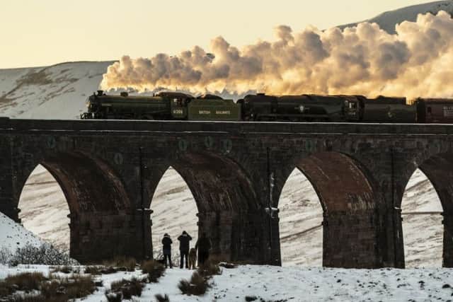 The Cumbrian Mountain Express heritage charter train passes over the viaduct
