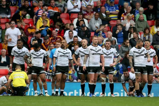 Hull FC players look dejected during the Dacia Magic Weekend match of the Betfred Super League at Anfield, Liverpool. (Picture: Richard Sellers/PA Wire)