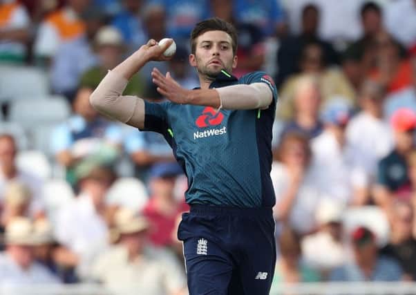 Hoping it is serious?: Pace bowler Mark Wood.
