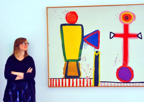Eleanor Clayon, curator at The Hepworth Wakefield, with Cross for the White Birds by Alan Davie. Picture: Gary Longbottom