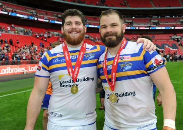 Leeds Rhinos duo Mitch Garbutt and Adam Cuthbertson after their Wembley win in 2015.