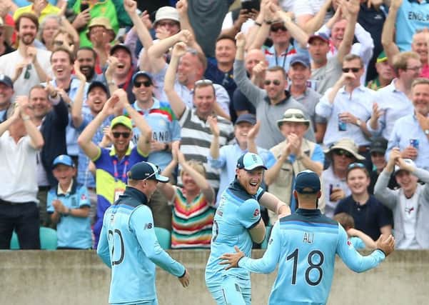 Got him: England's Ben Stokes celebrates his stunning catch off South Africa's Andile Phehlukwayo.