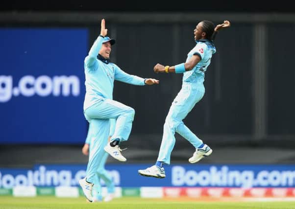 England's Jofra Archer (right) celebrates with team-mate Jason Roy after taking the wicket of South Africa's Aiden Markram at The Oval. Picture: Nigel French/PA