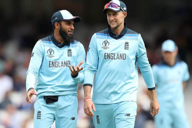 England's Adil Rashid (left) and Joe Root at The Oval. Picture: Tim Goode/PA