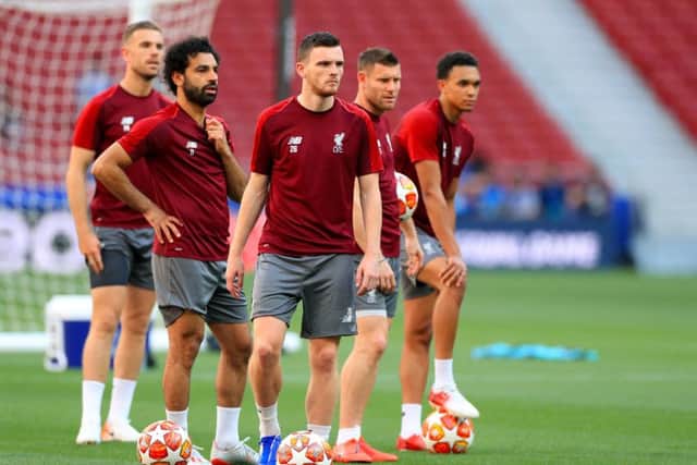 Liverpool's Andrew Robertson (centre) during a training session at the Estadio Metropolitano, Madrid. (Picture: PA)