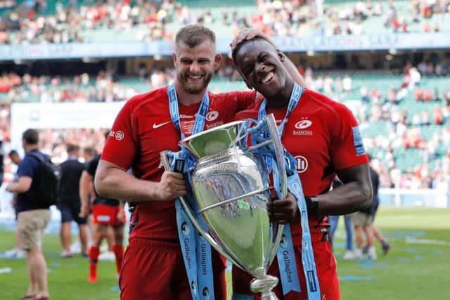 Saracens' George Kruis (left) and Maro Itoje celebrate with the trophy after winning the Gallagher Premiership Final at Twickenham. Picture: Darren Staples/PA