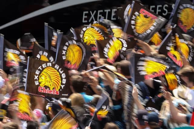 Bucking the trend: They may have lost to Saracens in the Premiership final but Exeter Chiefs fans, greeting the coach at Twickenham, have seen their club rise from obscurity to challenge the best.