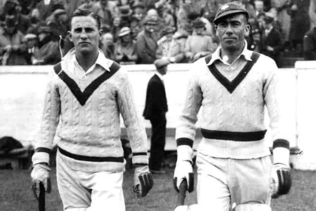 Sir Len Hutton, left, seen with Arthur Mitchell, holds Yorkshire's record for the most consecutive Championship matches with a century  seven.