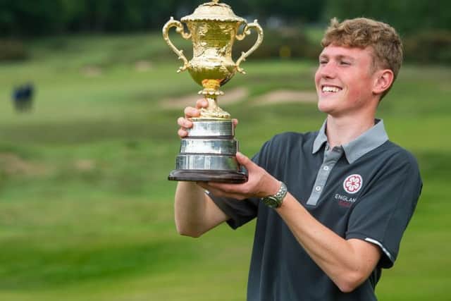 Rotherham's Ben Schmidt beams as he holds the Brabazon Trophy after his win at Alwoodley (Picture: Leaderboard Photography).