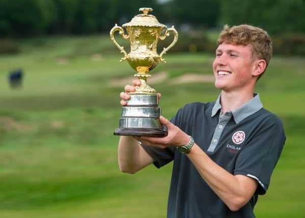 Rotherham's Ben Schmidt beams as he holds the Brabazon Trophy after his win at Alwoodley (Picture: Leaderboard Photography).