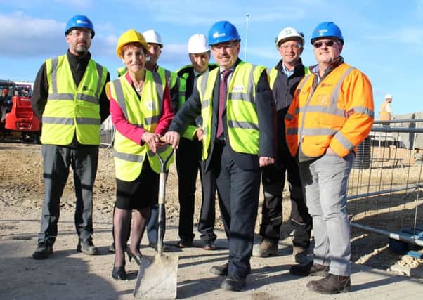 Mayor Norma Redfearn CBE, with Mike Furze, regional director at Kier, and their project team.