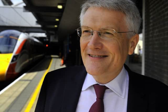 NLYP  Pacer     Rail Minister  Andrew Jones MP  at  Leeds station with a new Azuma train.