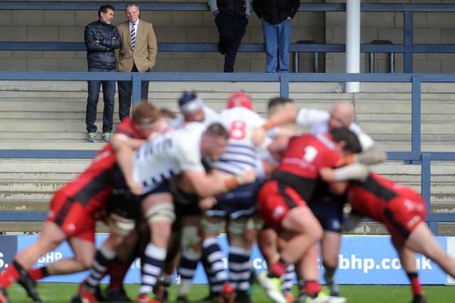 Gary Hetherington, right, watches on from an empty stand as Yorkshire Carnegie played Hartpury College in the Championship in April. (Picture: Tony Johnson)