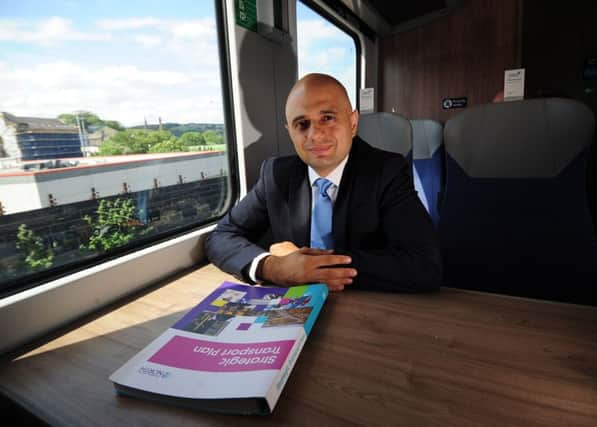 Home Secretary Sajid Javid pictured on the train as it leaves Huddersfield Station. Picture by Simon Hulme