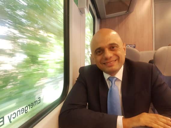 Home Secretary Sajid Javid speaks to The Yorkshire Post on a train from Manchester to Leeds