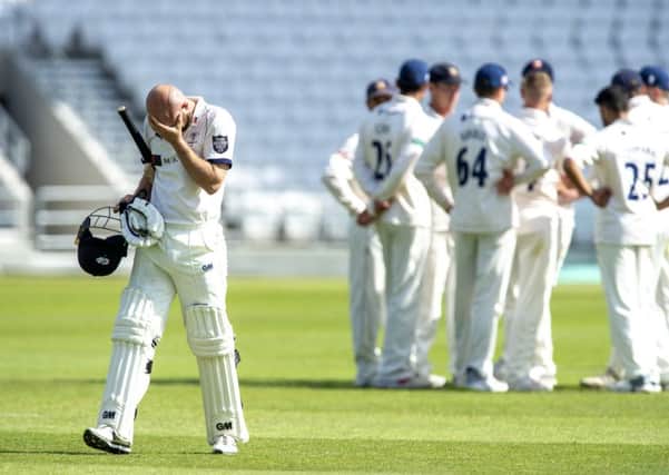 Yorkshires Adam Lyth is dismayed after getting out for 95 leaving Essex bowler Jamie Porter to celebrate after Will Buttleman took the catch (Picture: Bruce Rollinson).