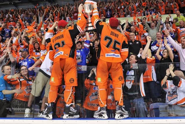 Ben O'Connor and Robert Dowd celebrate Sheffield Steelers' 2017 EIHL play-off final triumph over Cardiff - the last trophy lifted by the club. Picture: Dean Woolley.