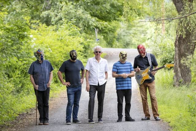 Nick Lowe and Los Straitjackets. Picture: Nils Schlebusch