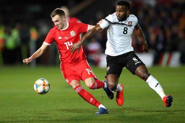 Ryan Hedges (left) playing for Wales against Trinidad and Tobago (Picture: PA)