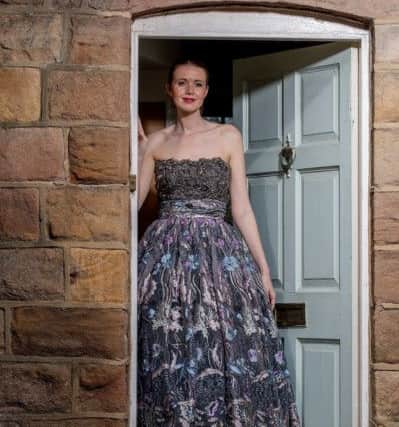Bespoke pewter strapless gown featuring ruched organza bodice with Swarovski crystal embellishment and richly embroidered tulle skirt over a birdcage crinoline, guide price £1200.



By Jillian Welch Design in Harrogate. Picture: Charlotte Graham

Pictures for the Great Yorkshire Show