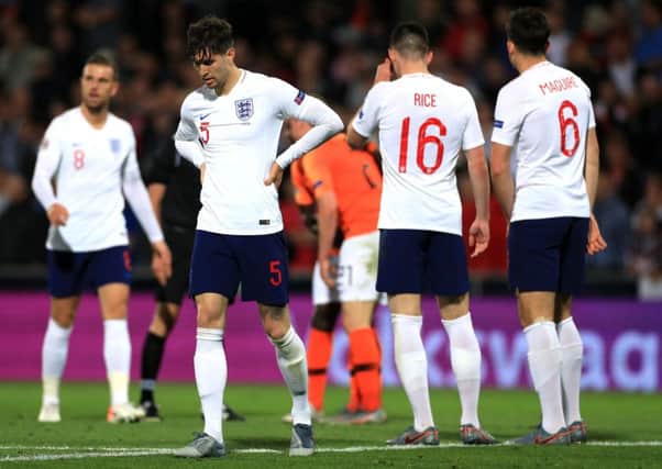 England's John Stones (second left) appears dejected during the Nations League Semi Final at Estadio D. Alfonso Henriques, Guimaraes. (Picture: Mike Egerton/PA Wire)