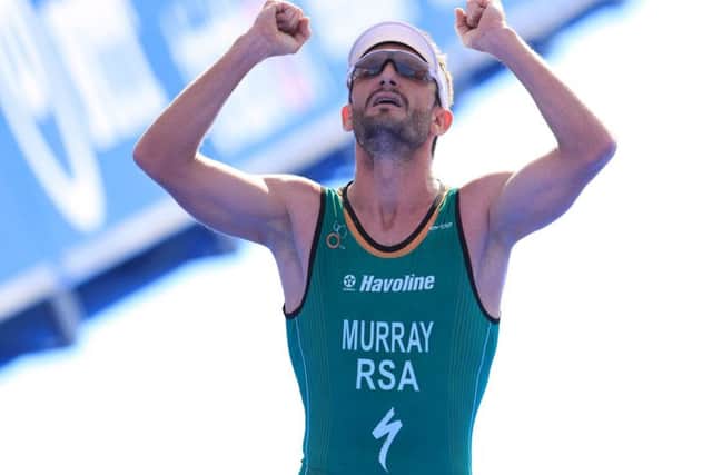 South Africa's Richard Murray celebrates as he crosses the line to win the elite men's race during the 2018 ITU World Triathlon Series Event in Leeds. (Picture: Mike Egerton/PA Wire)