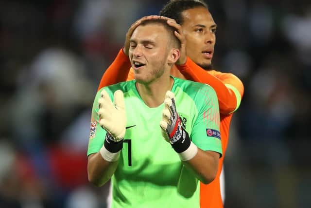 Netherlands' Virgil van Dijk (right) celebrates with goalkeeper Jasper Cillessen after the final whistle (Picture: PA)