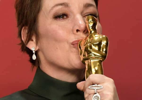 Oscar-winning actress Olivia Colman receives a CBE in the Queen's birthday honours.
