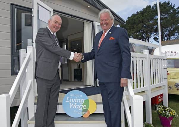 PatrickLangmaid15       06/06/19
Padstow holiday park owner Patrick Langmaid (left) has landed a £600,000 contract to a UK caravan manufacturer - because it believes in paying its staff a living wage. 
Mother Ivey's Bay Holiday Park will take delivery of 25 luxury holiday homes from the firm ABI, which recently became a member of the Living Wage Foundation charity. 
Patrick pictured here with ABI's Chairman, Mel Copper (right).