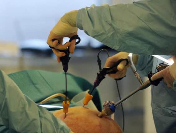 Surgeons use Surgicals products in a laparoscopic cholecystectomy operation