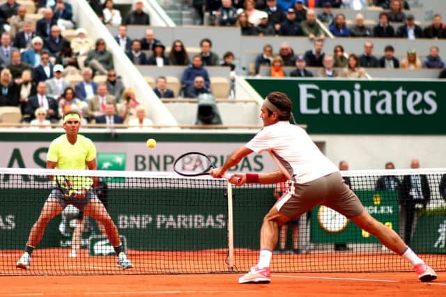 FAMILIAR TALE: Roger Federer plays a backhand volley during his French Open semi-final defeat to Rafael Nadal Picture: Clive Brunskill/Getty Images