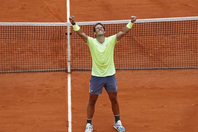 Spain's Rafael Nadal celebrates his record 12th French Open men's singles title. Picture: AP/Christophe Ena.