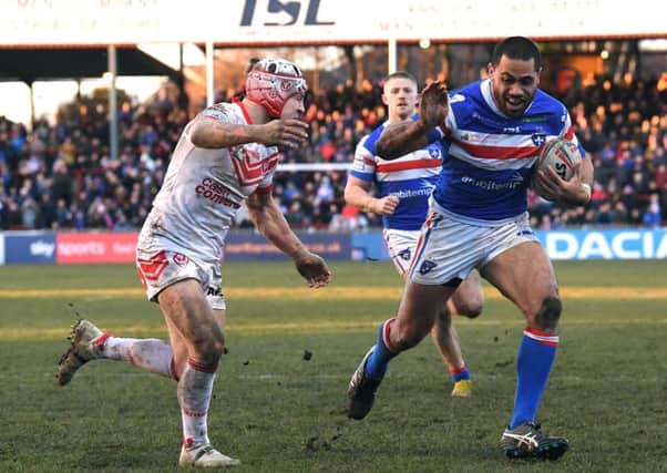 Bill Tupou goes in for a try against St Helens in February.
