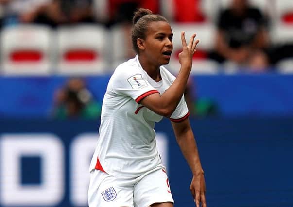 England's Nikita Parris: Hails the 'four musketeers' after scoring her side's penalty.