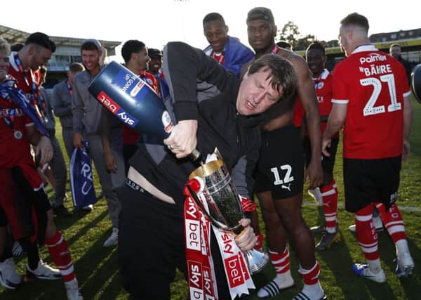 Bubbly character: Barnsley's manager Daniel Stendel celebrates promotion.