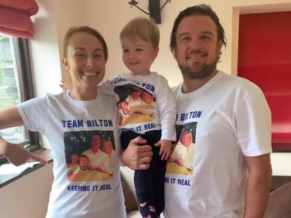 Laura and Nigel Holliday with their son Ted. The couple have done the Great North Swim on Lake Windermere and raised more than 8,800 for friend and chef Tim Bilton and his family