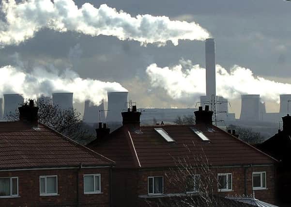 Theresa May wants Britain to eliminate greenhouse gas emissions by 2050.
