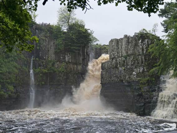 The River Tees is so high that water has been diverted over both channels of High Force