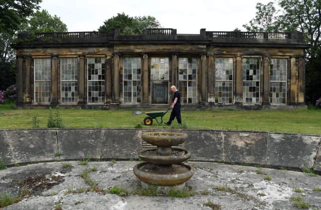 A group of strangers who volunteered to help with the gardening element of Wentworth Woodhouse's £100m restoration have become firm friends and are now known as the 'Tuesday Gang' for their weekly efforts to improve the state of the 87-acre site.
Pictured volunteer Glynn Bilson walking past the Camellia House.
4th June 2019.
Picture Jonathan Gawthorpe