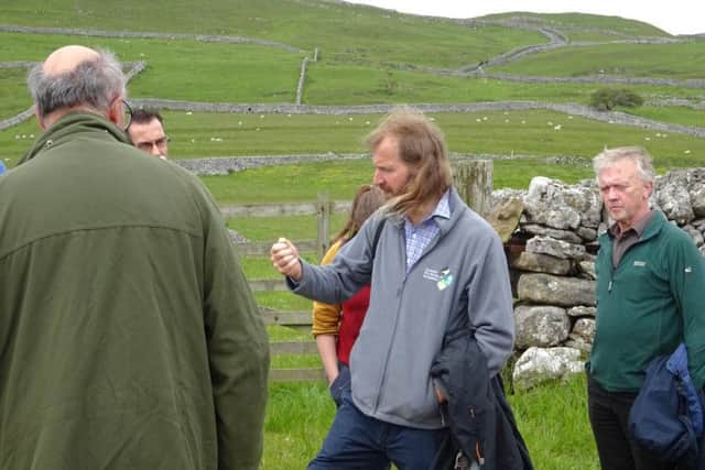 Fraser Hugill, northern co-ordinator of Championing the Farmed Environment, speaking at the group's relaunch event at Hill Top Farm in Malham. Picture by Chris Tomson.