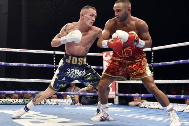 Getting to grips: Action from Josh Warrington v Kid Galahad. Picture: Steve Riding