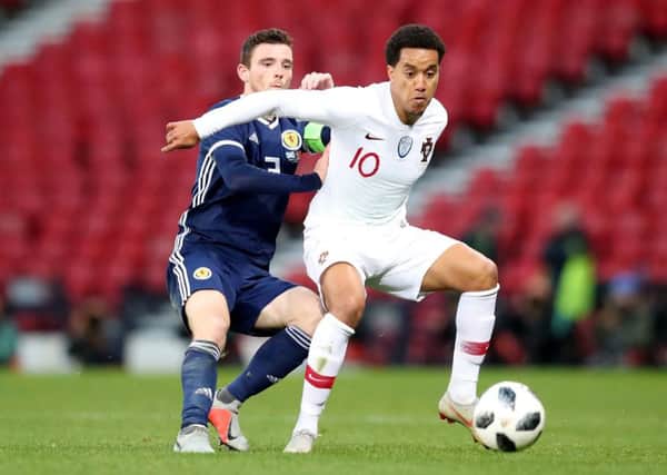 Key target: Portugal's Helder Costa, in action against Scotland, is wanted by Leeds United.